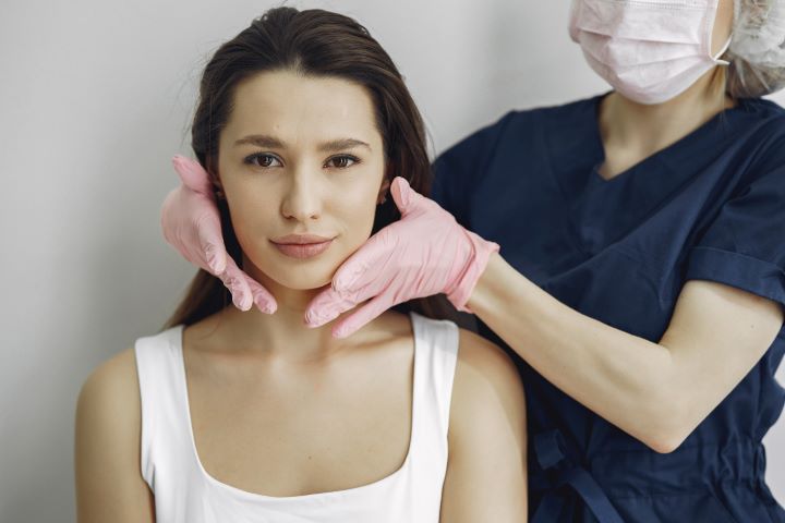 woman with doctor cosmetology studio