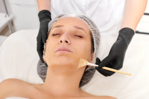 rsz 1beautician applies honey mask on woman face for mo 2023 11 27 05 34 05 utc