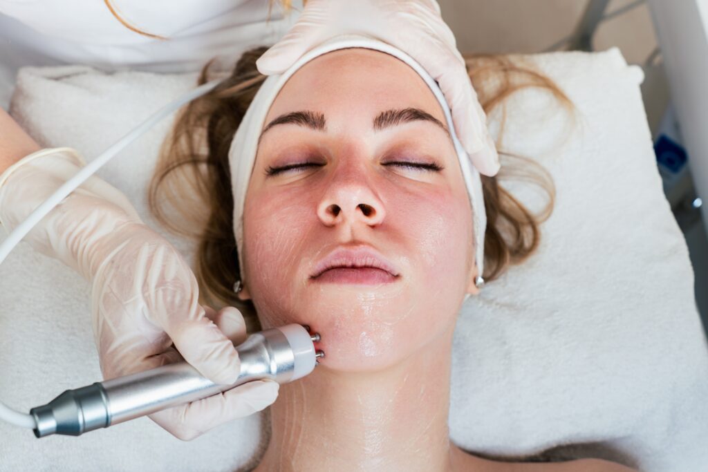 Young,Woman,Receiving,Modern,Radio frequency,Face,Tightening,Treatment ,Most,Popular